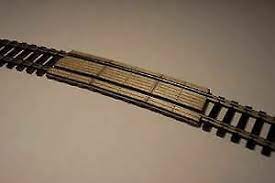 OMK-1049  -  22” Rad Crossing Boards 2pk - HO Scale