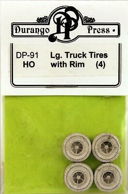 254-91  -  Truck Tires w/rims 4/ - HO Scale